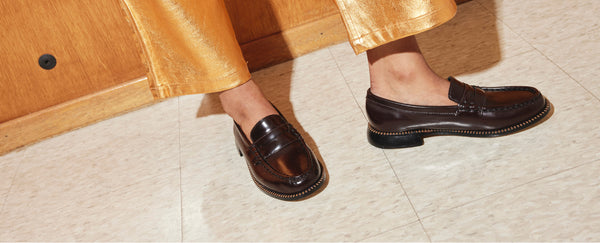 Image of woman wearing the Elba Penny Loafer in Black