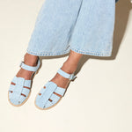 Blue suede SERA FISHERMAN sandal by FREDA SALVADOR featuring a casual, open-toe design with ankle straps.