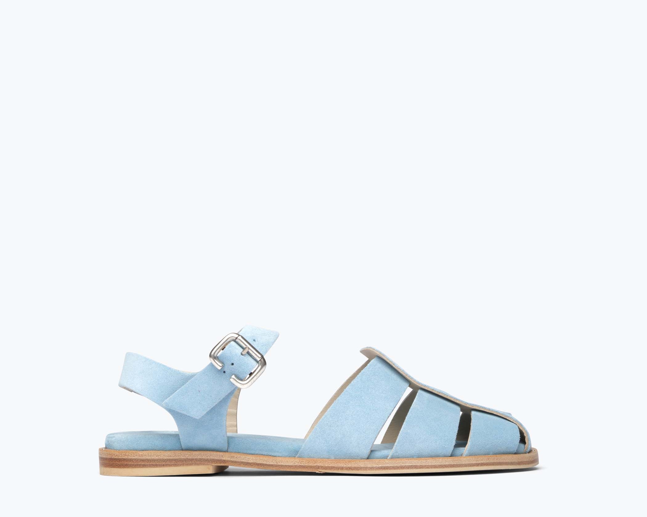 Blue suede SERA FISHERMAN sandal by FREDA SALVADOR with front view showing stylish straps and comfortable design.