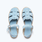 Blue suede Sera fisherman sandal by Freda Salvador featuring a strappy design and open toe.