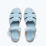 Blue suede Sera fisherman sandal by Freda Salvador featuring a strappy design and open toe.