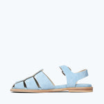 Blue suede SERA FISHERMAN sandal by FREDA SALVADOR with inside view showing textured footbed and stylish design.