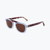 Sunglasses with tortoiseshell frame and brown lenses on a white background