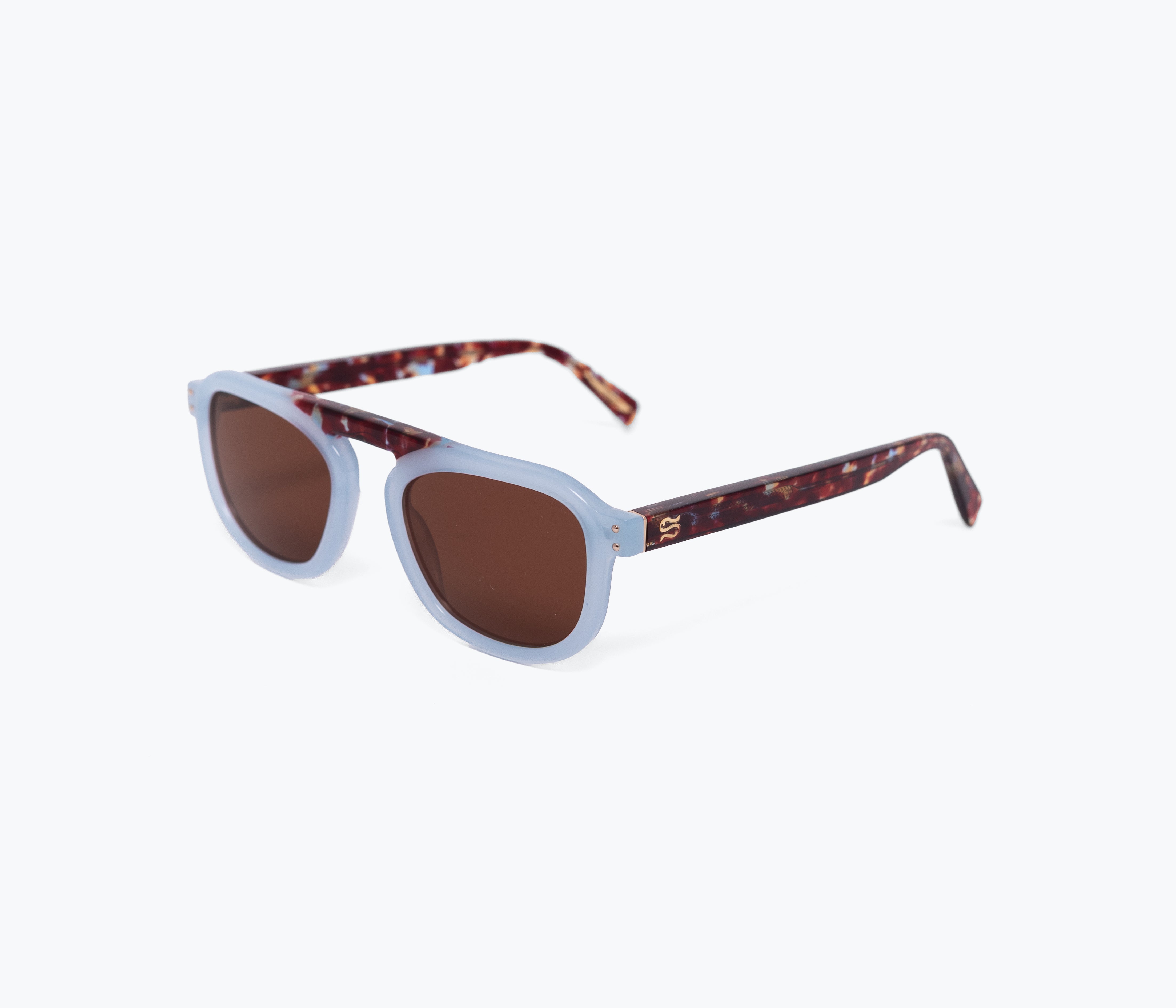 Sunglasses with tortoiseshell frame and brown lenses on a white background