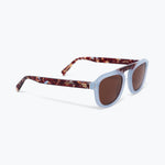 Sunglasses with tortoiseshell frame and brown lenses on a white background