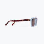 Sunglasses with tortoiseshell frame and light blue lenses on a white background