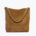 Freda Salvador CALA studded brown suede tote bag with sleek design and metal stud accents, front view.