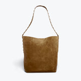 Cappuccino suede CALA studded tote bag by FREDA SALVADOR with gold-tone hardware and top handles, front view.