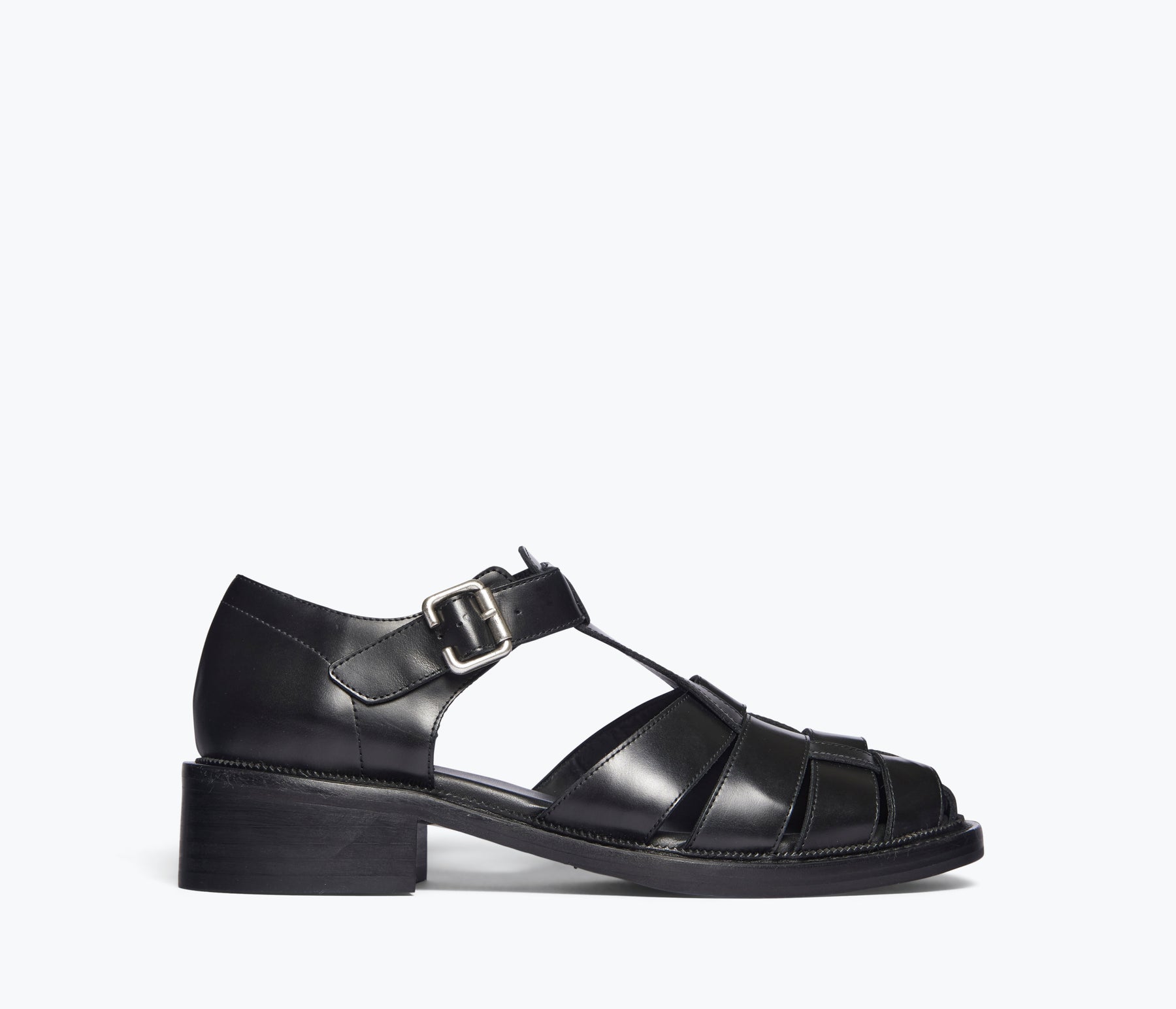 A black loafer sandal