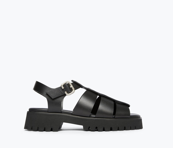 Black Darya Lug Sole Fisherman sandal by Freda Salvador, showcasing front view with adjustable straps and chun