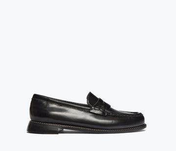 Black FREDA SALVADOR Elba Penny Loafer with sleek leather design and classic penny slot, viewed from the front.