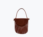 Freda Salvador Erika Crescent Fringe Bag featuring a red leather exterior with fringe detailing and a slim, compact design.