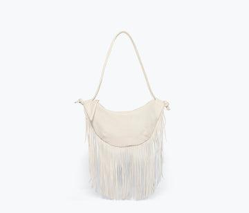 Freda Salvador Erika Crescent Fringe Bag in bone calf leather with fringe detailing, shown from the front view.