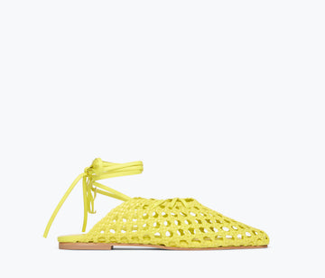 Yellow woven calf strap ETTA ankle lace-up mule by Freda Salvador with front view and flat sole.