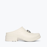 Freda Salvador FS X WESTECH OUTRIDER slip-on mule with charm detail, front view showcasing stylish design and craftsmanship.
