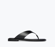 Freda Salvador Halle leather thong sandal in black, featuring a sleek front view with minimalist design and smooth calf leather straps.