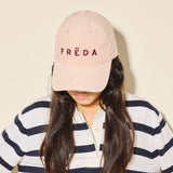 Embroidered Freda Hat in blush corduroy, on figure
