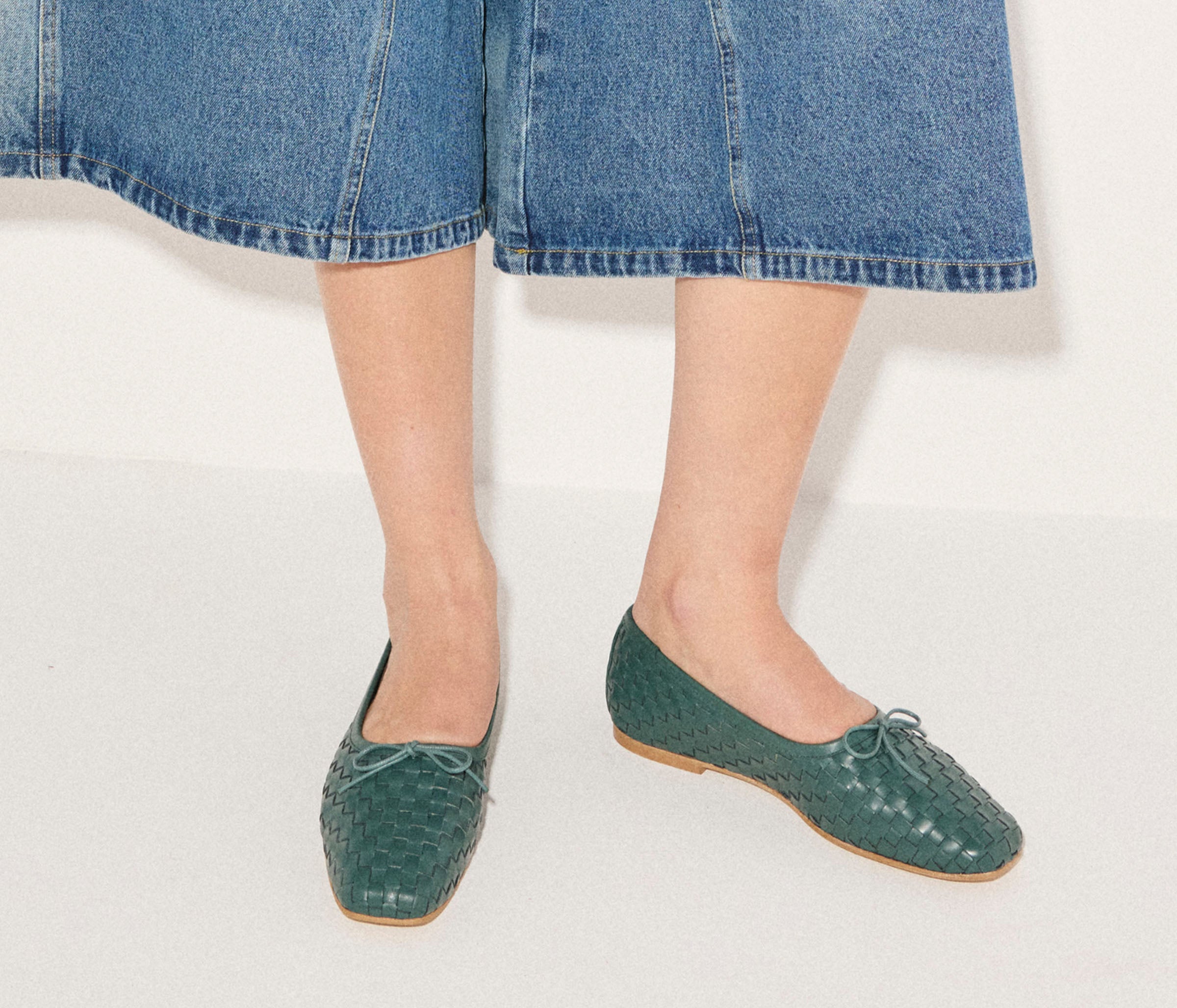Freda Salvador JADA square toe ballet flat in emerald woven calf leather, featuring a sleek design and comfortable flat sole.