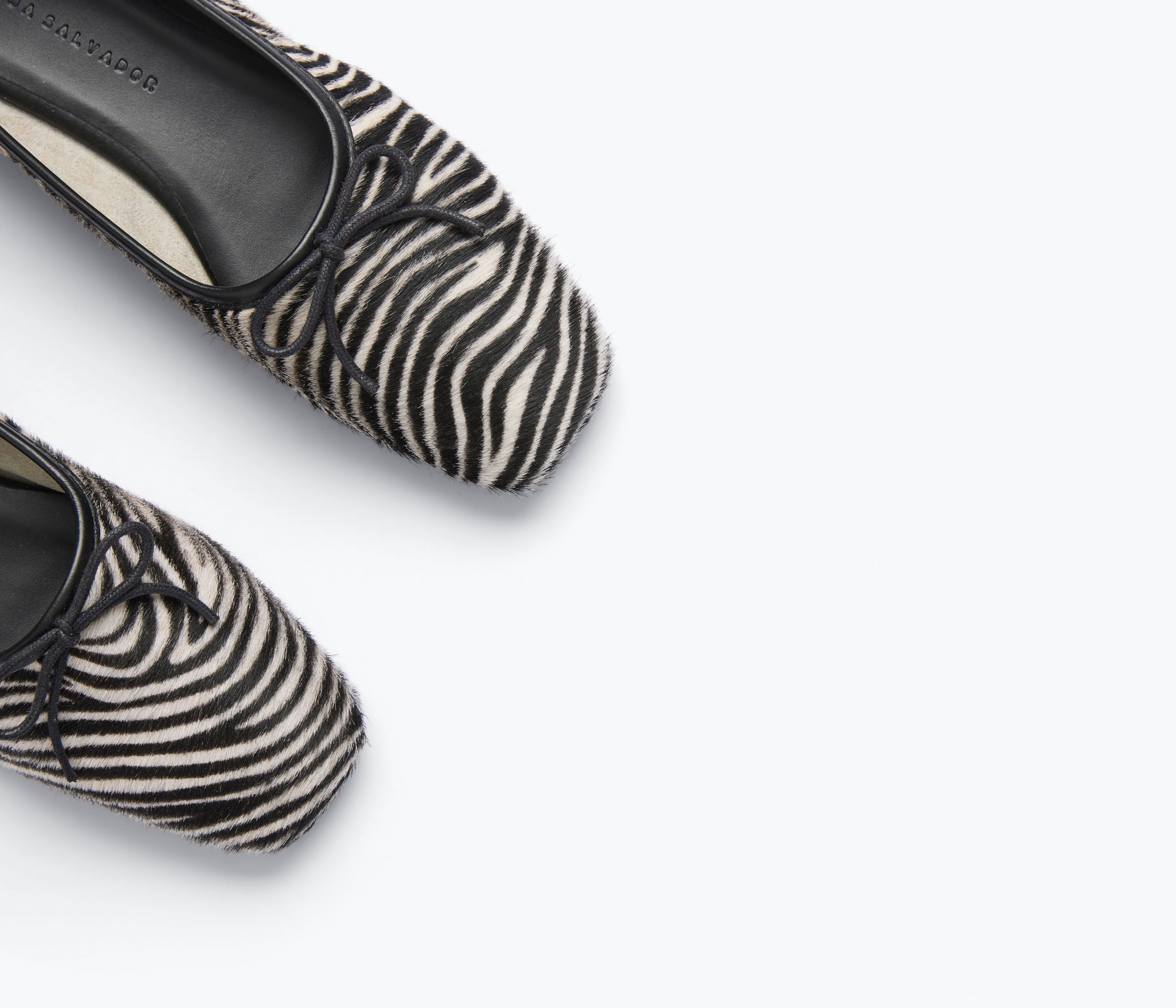 Fredas Salvador JADA square toe ballet flat in zebra hair calf with detailed close-up of textured animal print.
