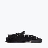Black suede Leon tassel penny loafer mule by Freda Salvador, showing the inside view with tassel details and sleek design.
