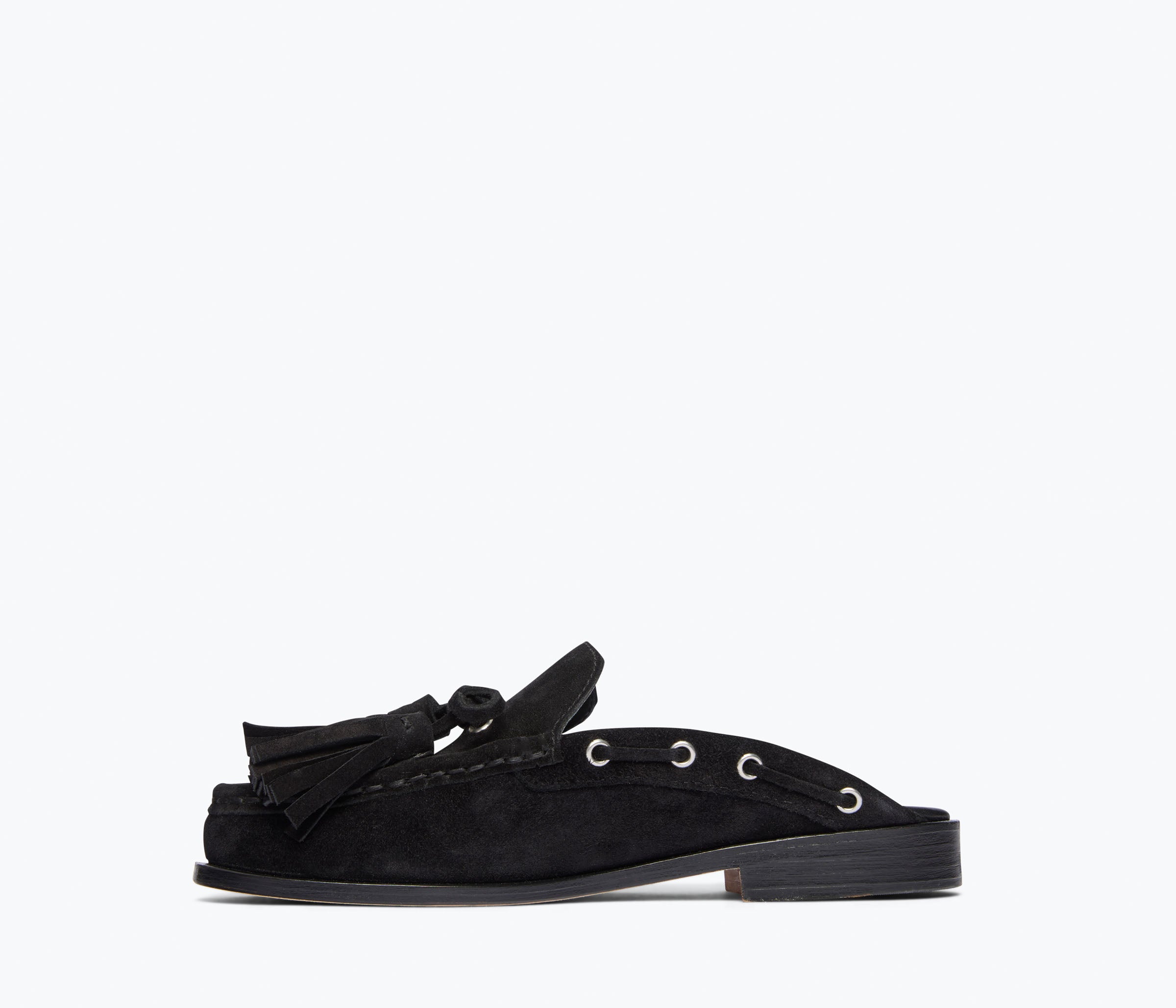 Black suede Leon tassel penny loafer mule by Freda Salvador, showing the inside view with tassel details and sleek design.