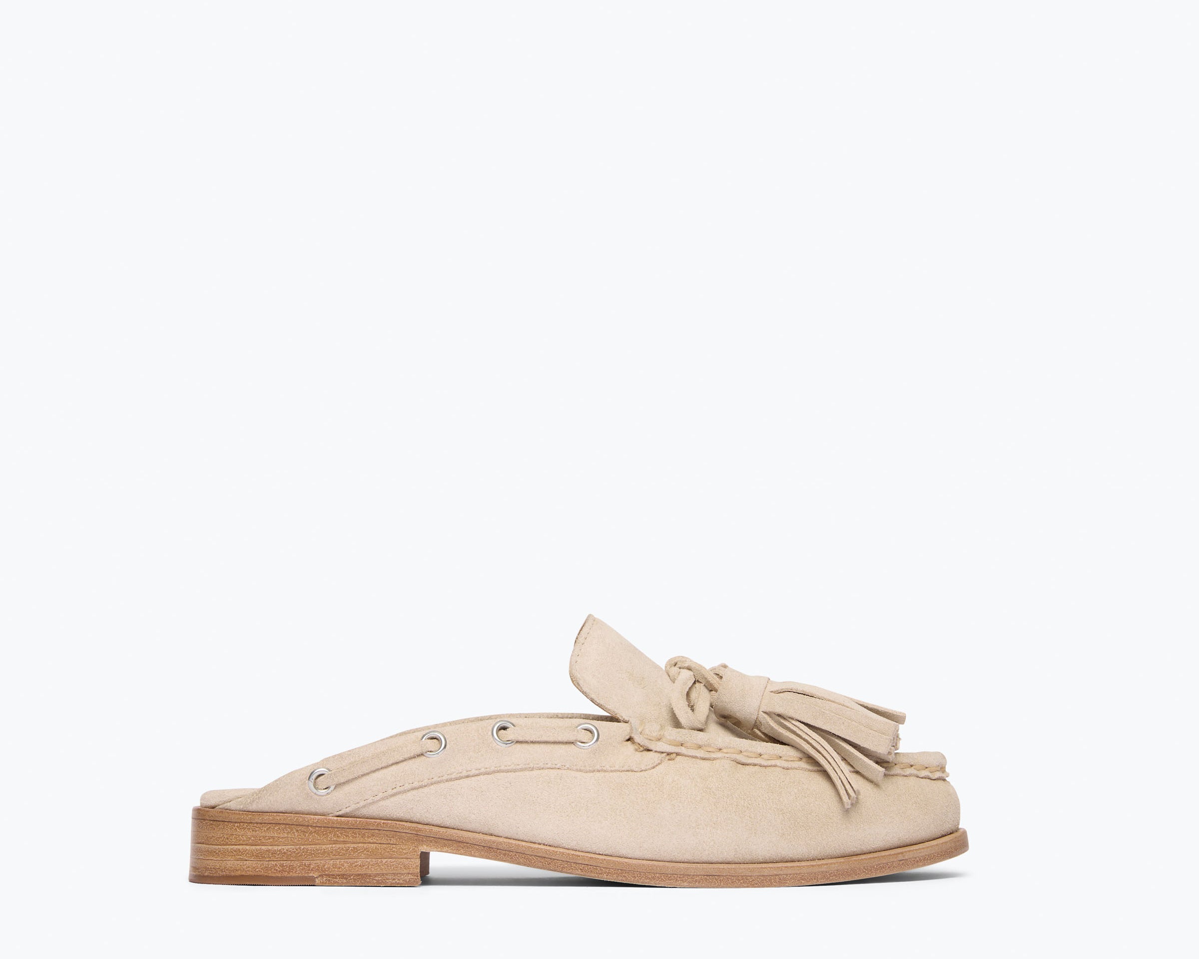Freda Salvador Leon Tassel Penny Loafer Mule in Sahara suede, front view showing tassel detail and sleek slip-on design.