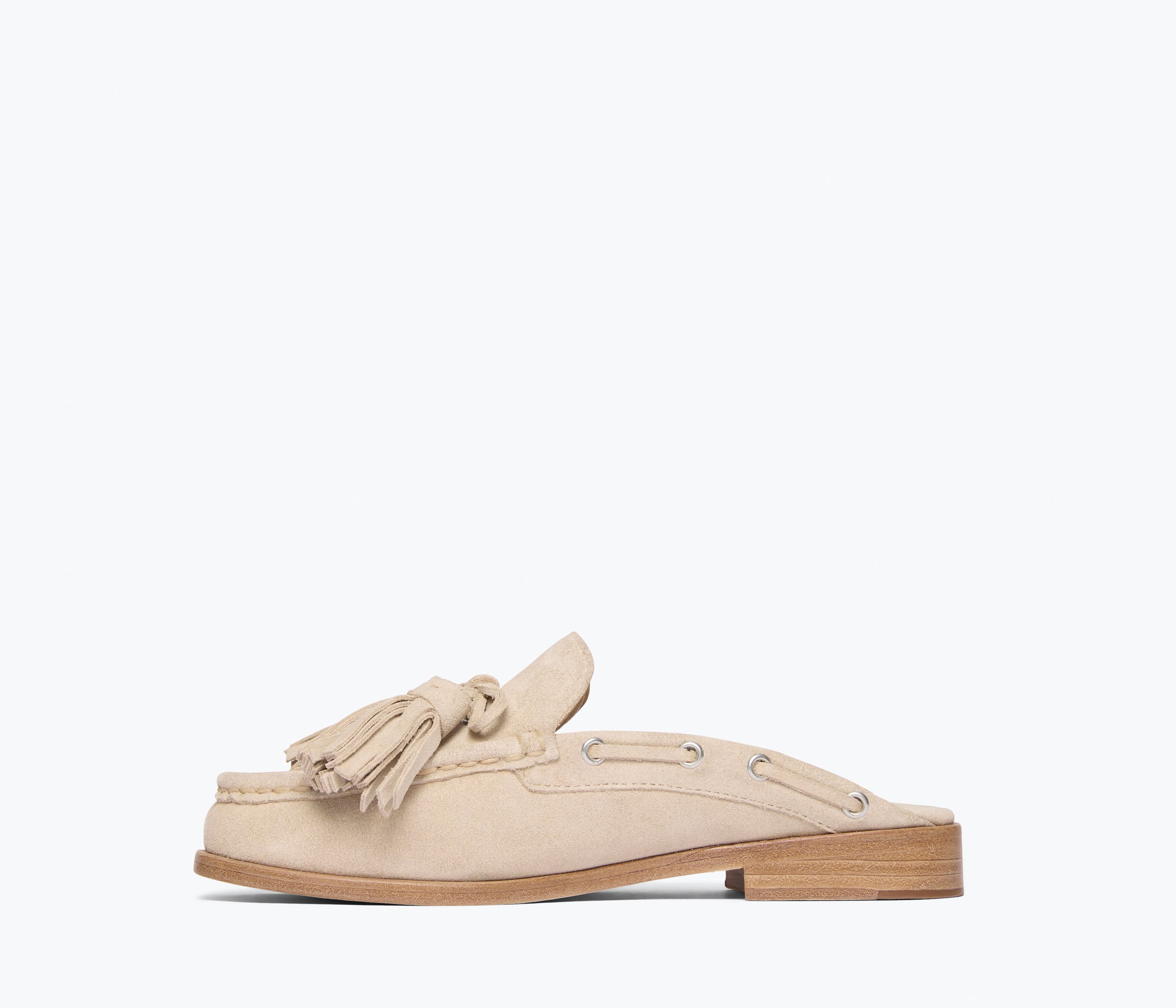 Fred Salvador Leon tassel penny loafer mule in tan suede, showing the inside view with detailed tassel and classic loafer design.