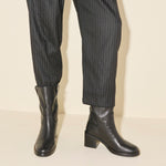 NAN boot in black buffalo, styled on figure