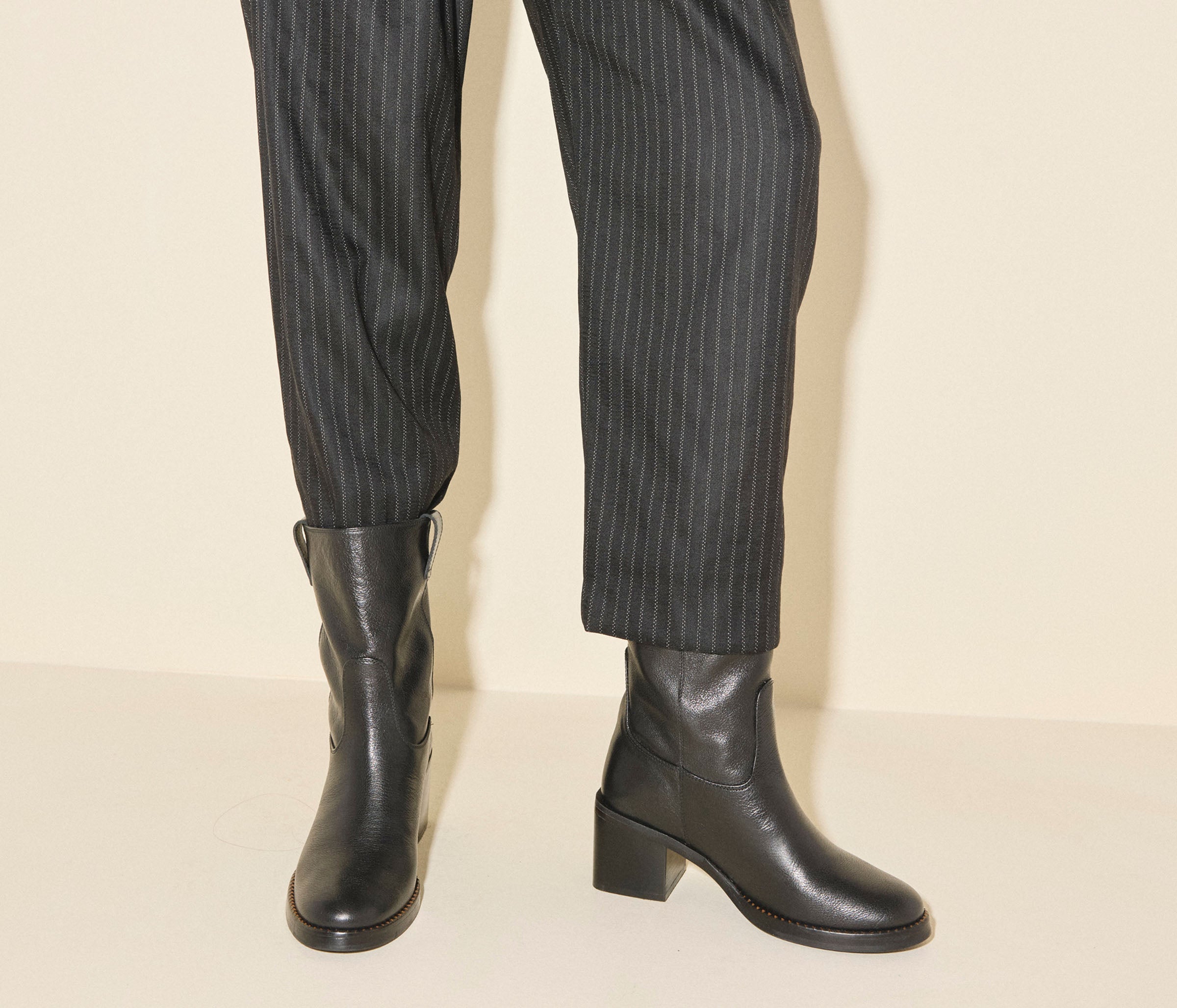 NAN boot in black buffalo, styled on figure