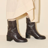 NAN boot in redwood buffalo, on figure