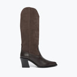 A single mid-calf boot in dark brown leather and medium brown suede, shown from a side profile against a plain white background.