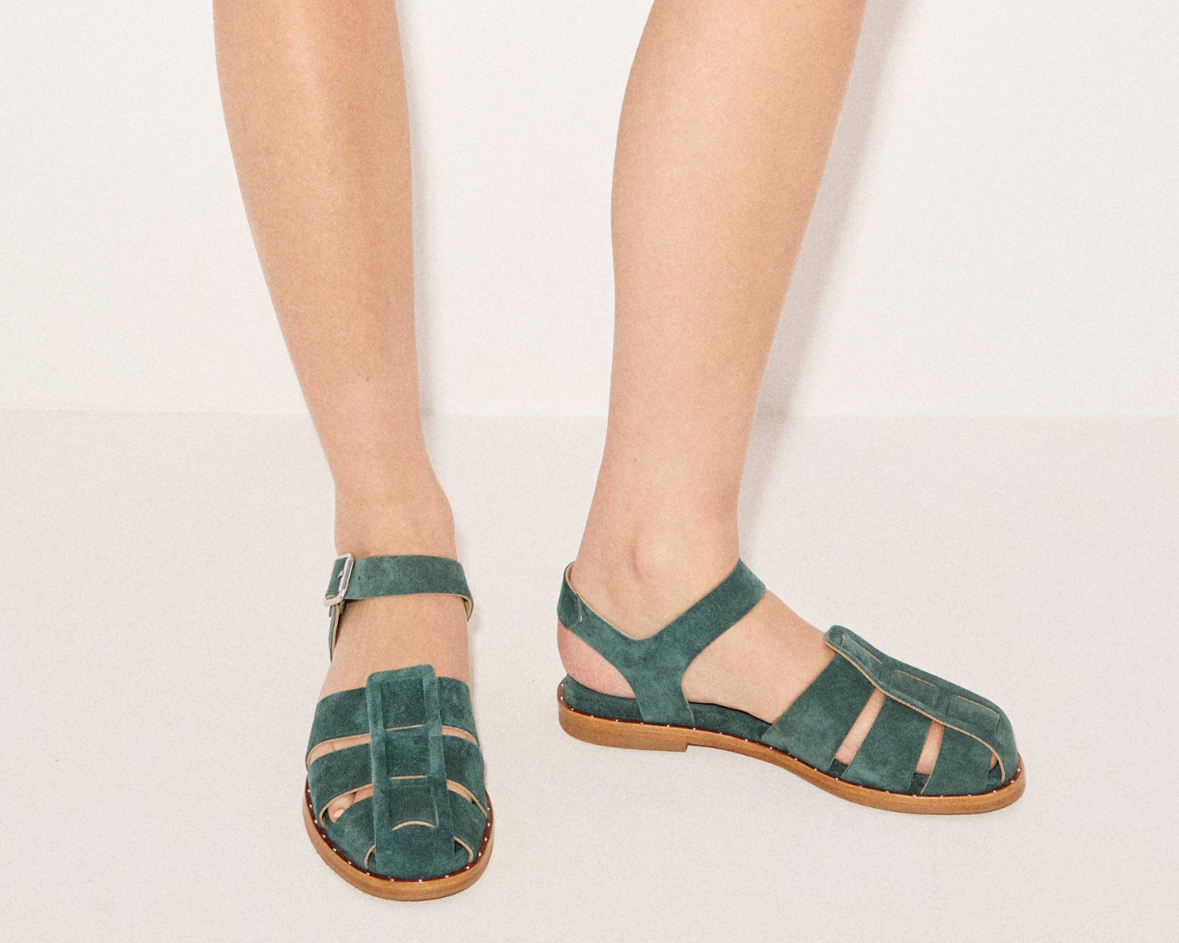 Fredas Salvador SERA fisherman sandal in lush emerald suede with a sleek design and comfortable strap details.