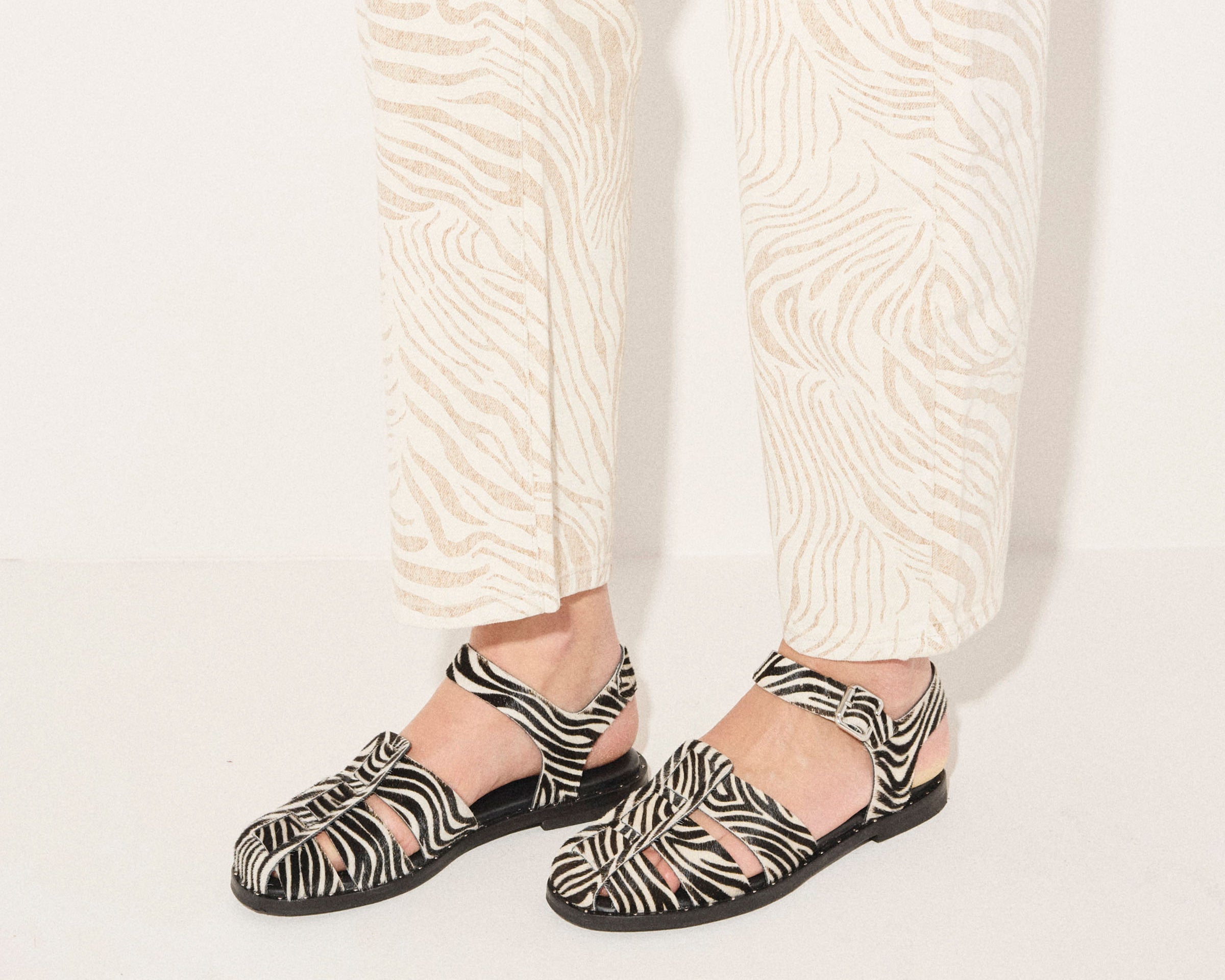 Freda Salvador Sera Fisherman Sandal with zebra hair calf leather straps and woven sole, stylish and comfortable footwear.
