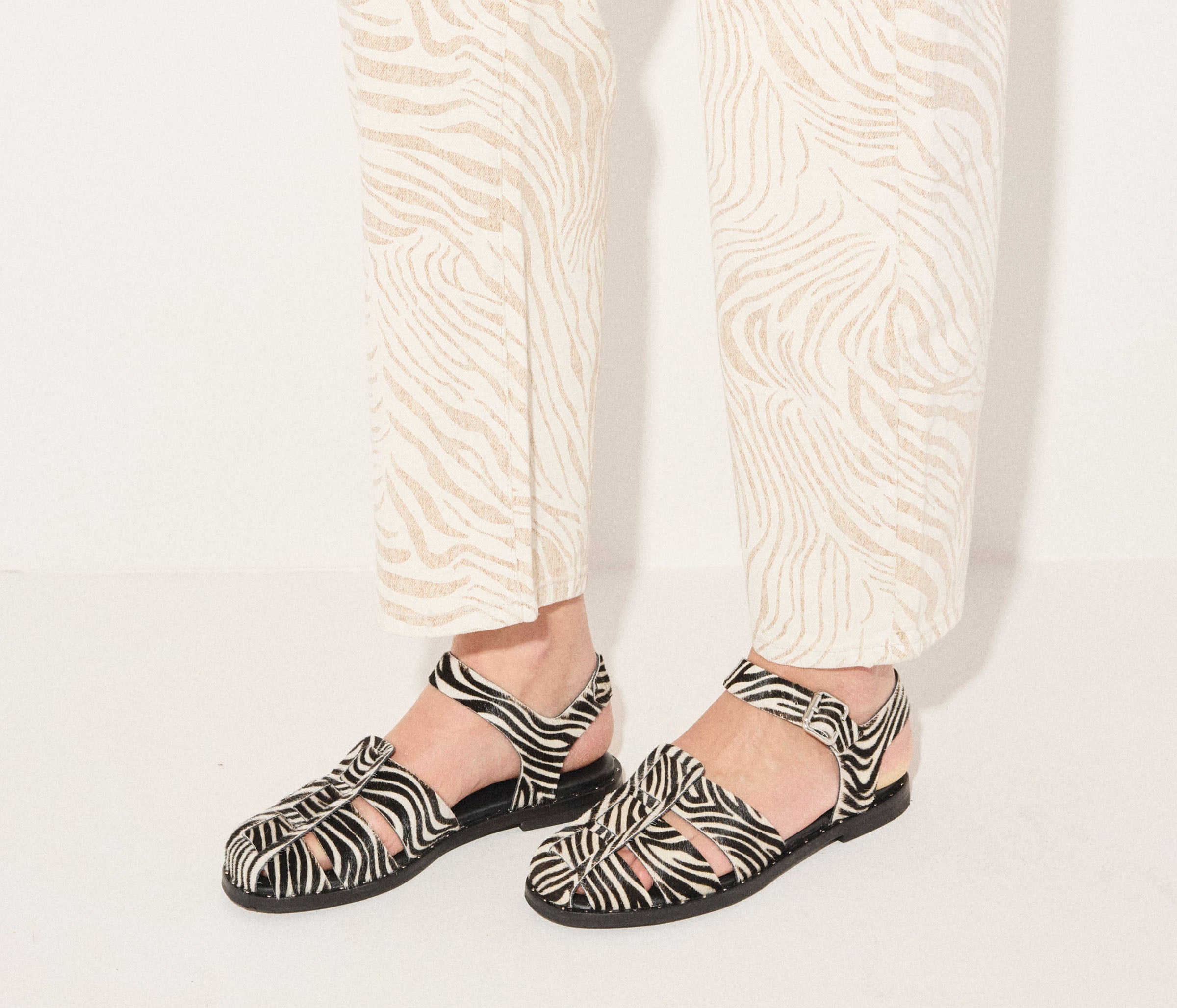 Freda Salvador Sera Fisherman Sandal with zebra hair calf leather straps and woven sole, stylish and comfortable footwear.