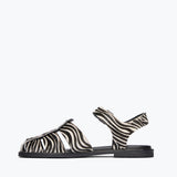 Freda Salvador SERA fisherman sandal with zebra hair calf leather, showing inside view of stylish, high-quality footwear.