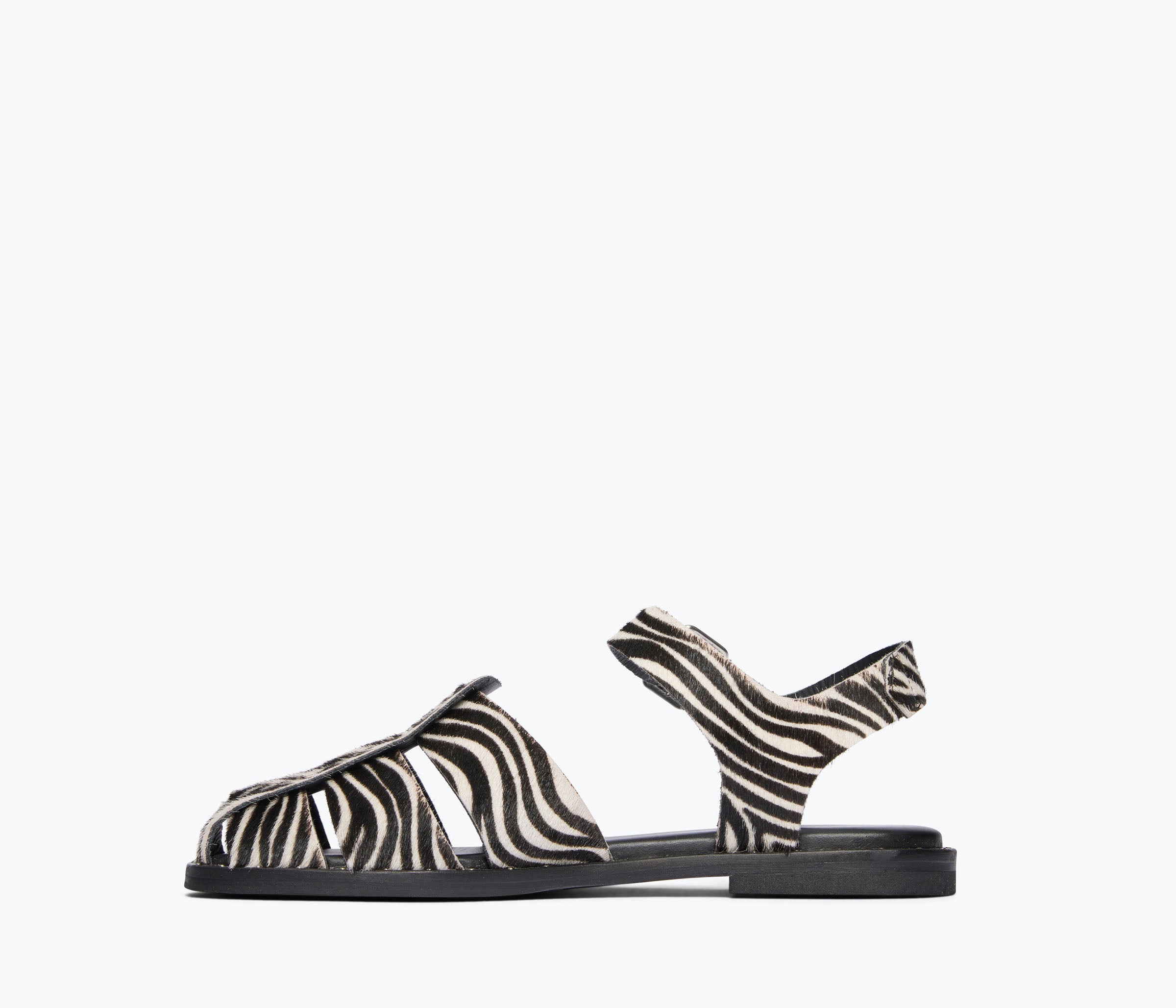 Freda Salvador SERA fisherman sandal with zebra hair calf leather, showing inside view of stylish, high-quality footwear.
