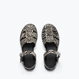 Freda Salvador SERA fisherman sandal with zebra print hair calf leather, showcasing stylish ankle strap design.