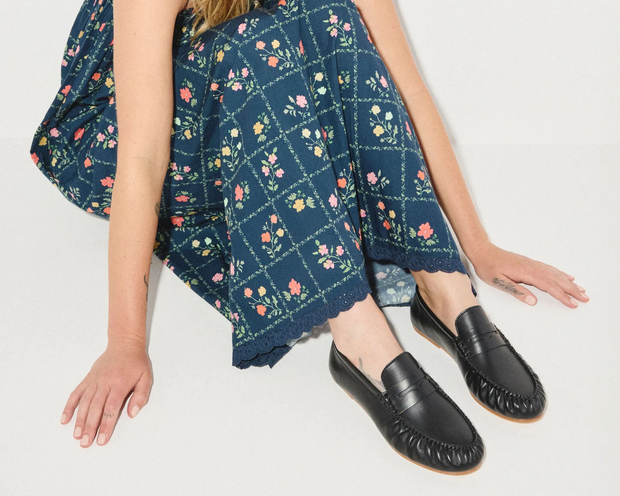 Black calf leather Sydney Ruched Penny Loafer sandal by FREDA SALVADOR with ruched detailing and classic slip-on style.