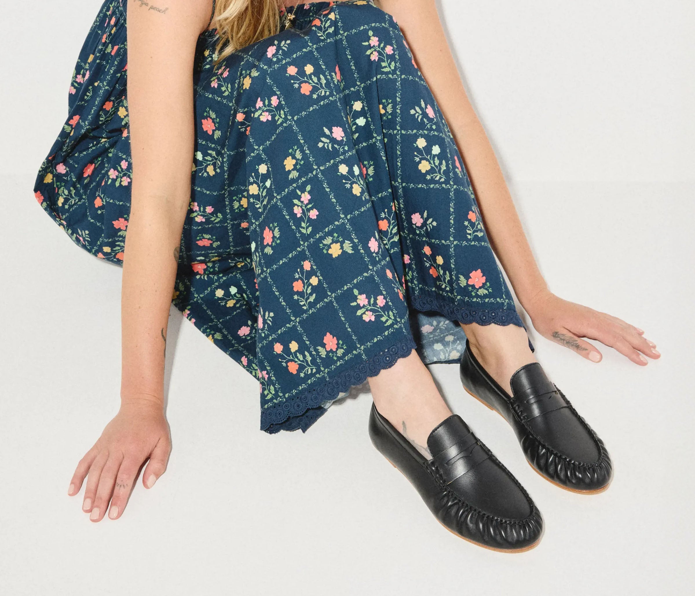 Black calf leather Sydney Ruched Penny Loafer sandal by FREDA SALVADOR with ruched detailing and classic slip-on style.