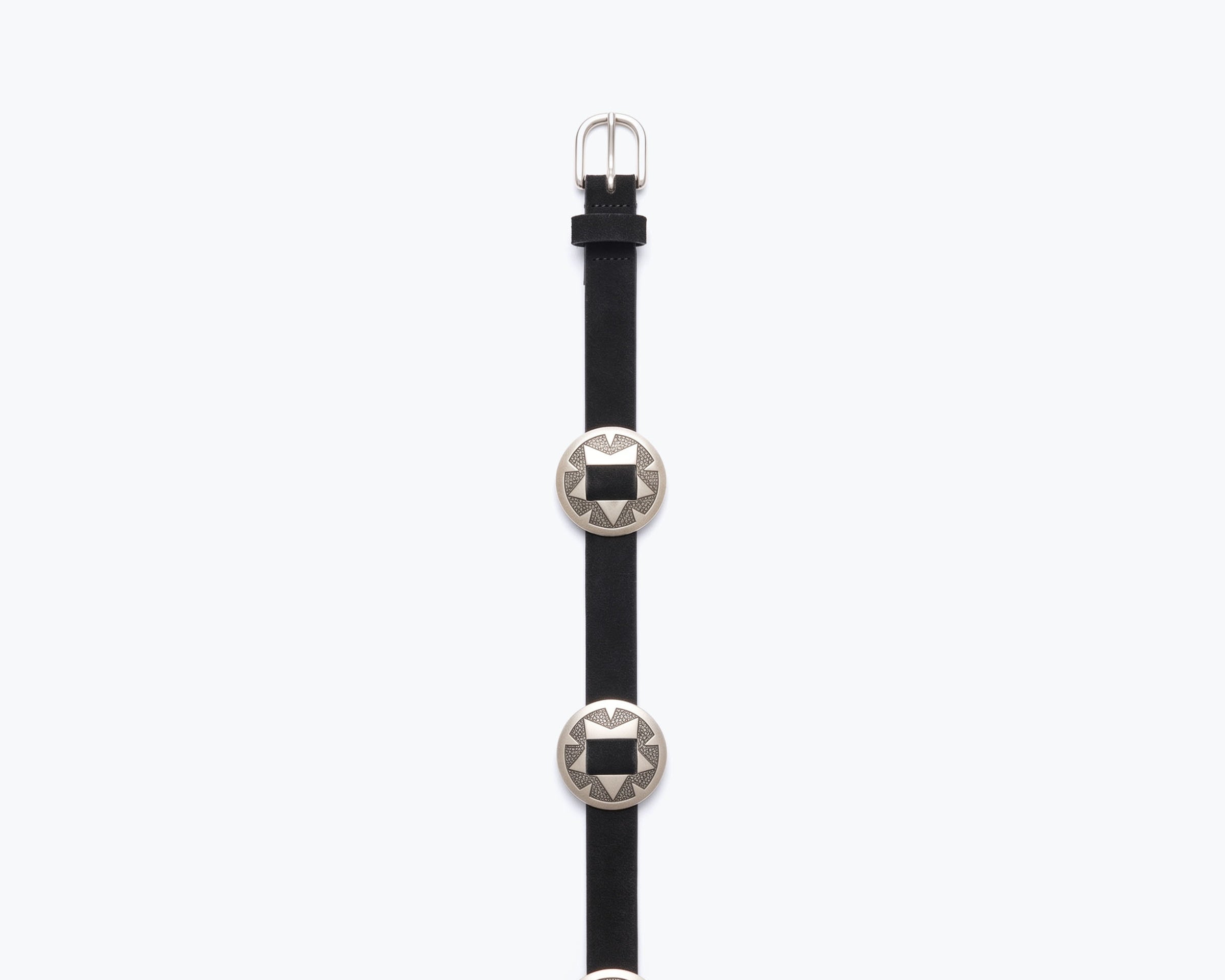Black suede TESS belt by Freda Salvador, featuring a sleek design and metal buckle, displayed on a neutral background.