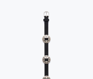 Black suede TESS belt by Freda Salvador, featuring a sleek design and metal buckle, displayed on a neutral background.