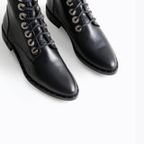 Freda Salvador RALF lace-up leather boot with chunky heel and stylish design, shown in black on a plain background.