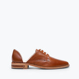 FRĒDA SALVADOR WIT D'ORSAY loafer in beige leather, featuring classic slip-on design and elegant detailing.