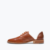 FRĒDA SALVADOR WIT D'ORSAY loafer in beige leather with classic slip-on design and elegant stitching details.