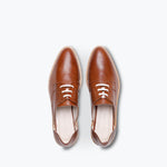 FRĒDA SALVADOR WIT D'ORSAY loafer featuring sleek leather design and classic slip-on style, displayed on a neutral background.