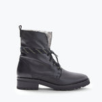 FRĒDA SALVADOR hike boot with shearling lining and rugged sole, shown from the front view.