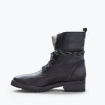 Inside view of FRĒDA SALVADOR Hike Boot with shearling lining, showcasing comfortable interior and durable outdoor footwear design.