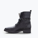 Inside view of FRĒDA SALVADOR Hike Boot with shearling lining, showcasing comfortable interior and durable outdoor footwear design.