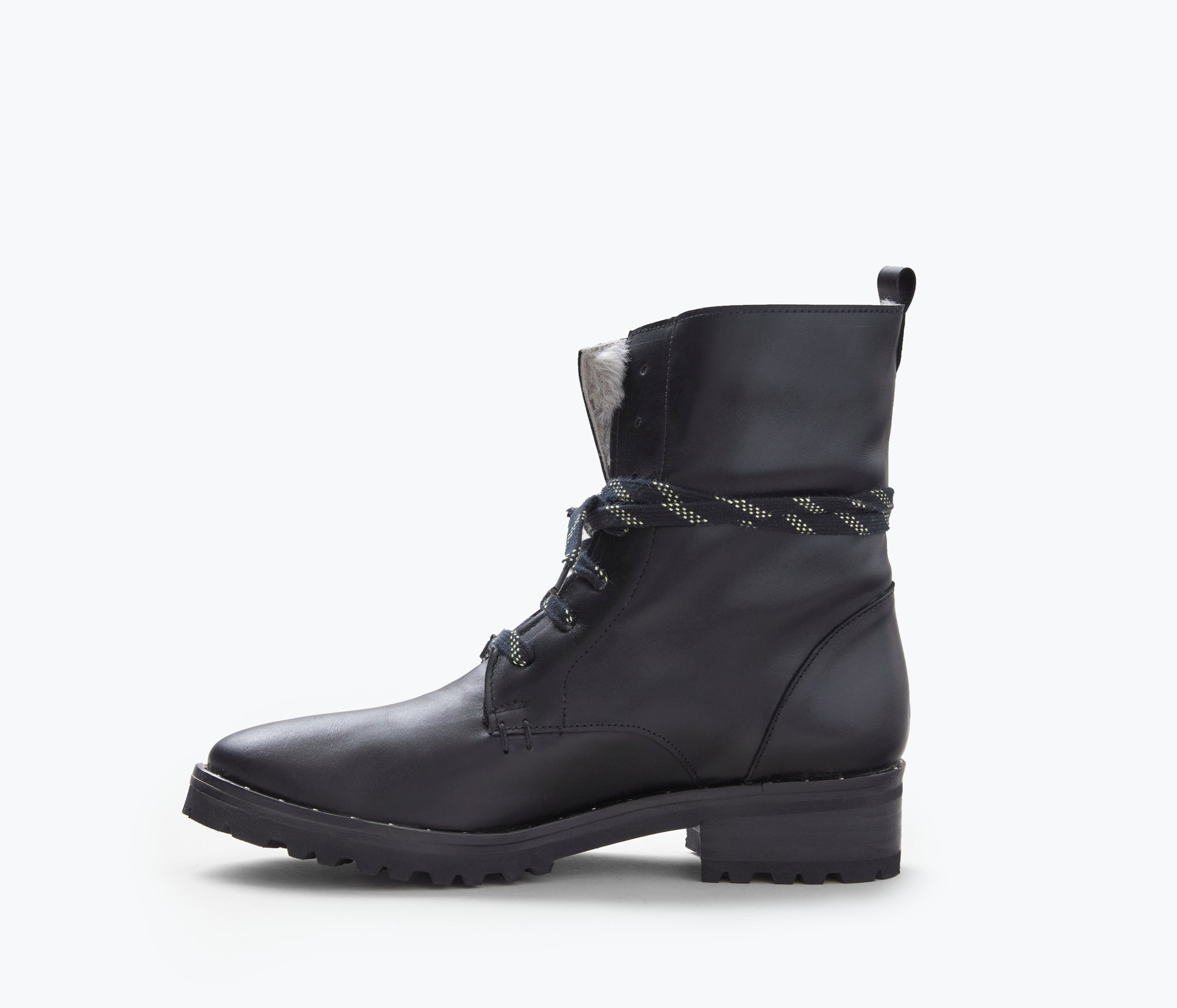Inside view of FRĒDA SALVADOR Hike Boot with shearling lining, showcasing comfortable interior and durable outdoor footwear design.