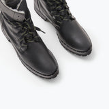 FRĒDA SALVADOR hike boot with shearling lining, featuring rugged design and ankle-high style, shown from the top angle.